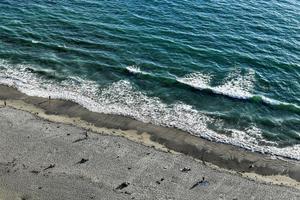 Black's Beach in San Diego, California, a clothing optional beach, popular with Southern California nudists and naturists. photo