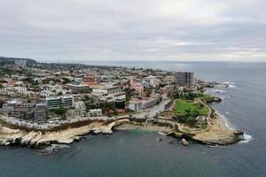 The Blue Waters of the Pacific Ocean Coastline Along the Beach of La Jolla, California. photo