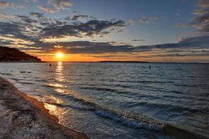 Sunset along the beach at Towd Point in Southampton, Long Island, New York. photo