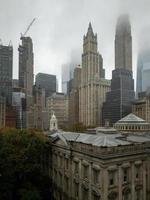 View of downtown Manhattan Skyline on a cloudy day in New York City. photo