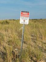 Area closed sign in Sandy Hook along the New Jersey shore. photo