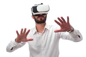 Man experiencing virtual reality wearing virtual reality glasses photo