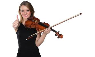 Beautiful natural blond girl playing violin. isolated on white photo