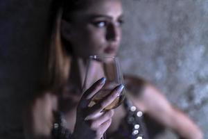 attractive woman drinking wine photo