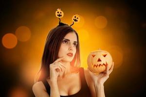 cutie girl in halloween style clothes photo