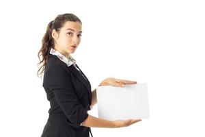 woman in uniform with white placard in hands photo