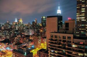 The NYC Skyline along the East Side of Manhattan at night. photo