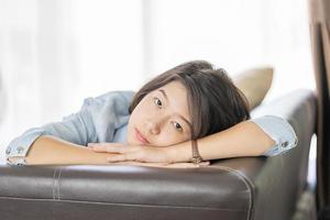 Woman short hair relaxation in living room photo