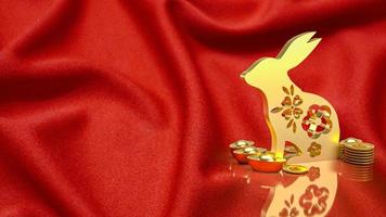 The gold rabbit and vintage Chinese money on red background  3d rendering photo