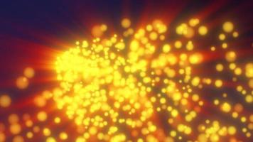 Abstract flying small round yellow glowing particles of bokeh and glare with shiny energy magical glowing rays on a dark background. Abstract background. Video in high quality 4k, motion design