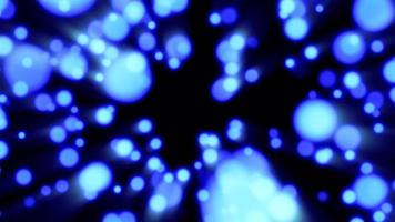 Beautiful festive bokeh effect, blue circles of light shining falling falling glowing christmas new year on black background. Abstract background. Screensaver, video in high quality 4k