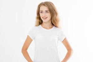 Young caucasian blonde girl isolated on white background. Copy space. Mock up. Summer woman clothes blank template white t shirt. Perfect skin. Skincare and makeup concept. photo