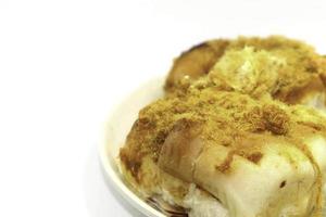Delicious bread with flossy pork bun, freshly baked with cheese and butter, is a delicious breakfast in the bakery. photo