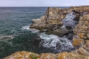 spectacular landscape at stone arc cliffs near Tyulenovo village, Black Sea, Bulgaria photo