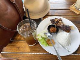 Spicy hot honey roasted grilled spare ribs from summer BBQ served with hot chili paste photo