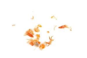 Shrimp heads and shrimp shells, food waste, leftovers, waste. Natural seafood. Lunch. Dinner isolated on white background. photo