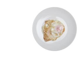 fried eggs on a white background photo