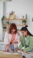 Young women play with flour on table video