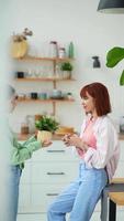 Young women make arrangements with plants video