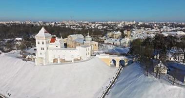 circular flight and aerial winter panoramic view overlooking the old city and historic buildings of medieval castle with snow video