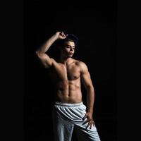 man with muscle body in studio photo