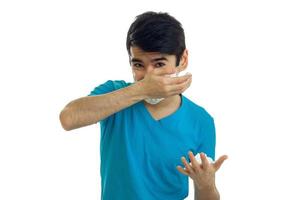 a young guy in the blue shirt deals hands shaving foam on your face photo