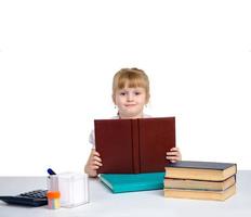 cheerful schoolgirl with book in her hands photo