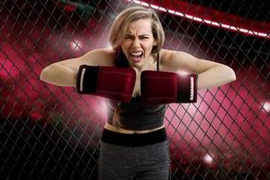 angry young blonde woman mma fighter photo