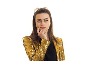 portrait of stylish young woman in golden jacket photo