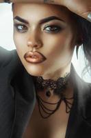 Voluptuous young sexy girl with big lips and nice make up photo