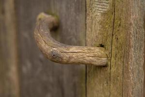 ancient wooden door handle photo