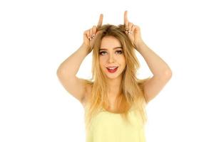 girl in yellow t-shirt posing in studio photo