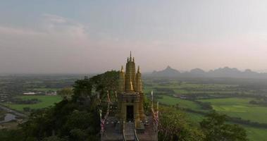 An aerial view of Santi Pagoda on the mountain stands prominently at Hup Pha Sawan in Ratchaburi near the Bangkok, Thailand video