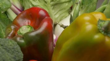 Red and yellow pepper and mixed various vegetables, healthy vegan or vegetarian food, diet, nutrition video