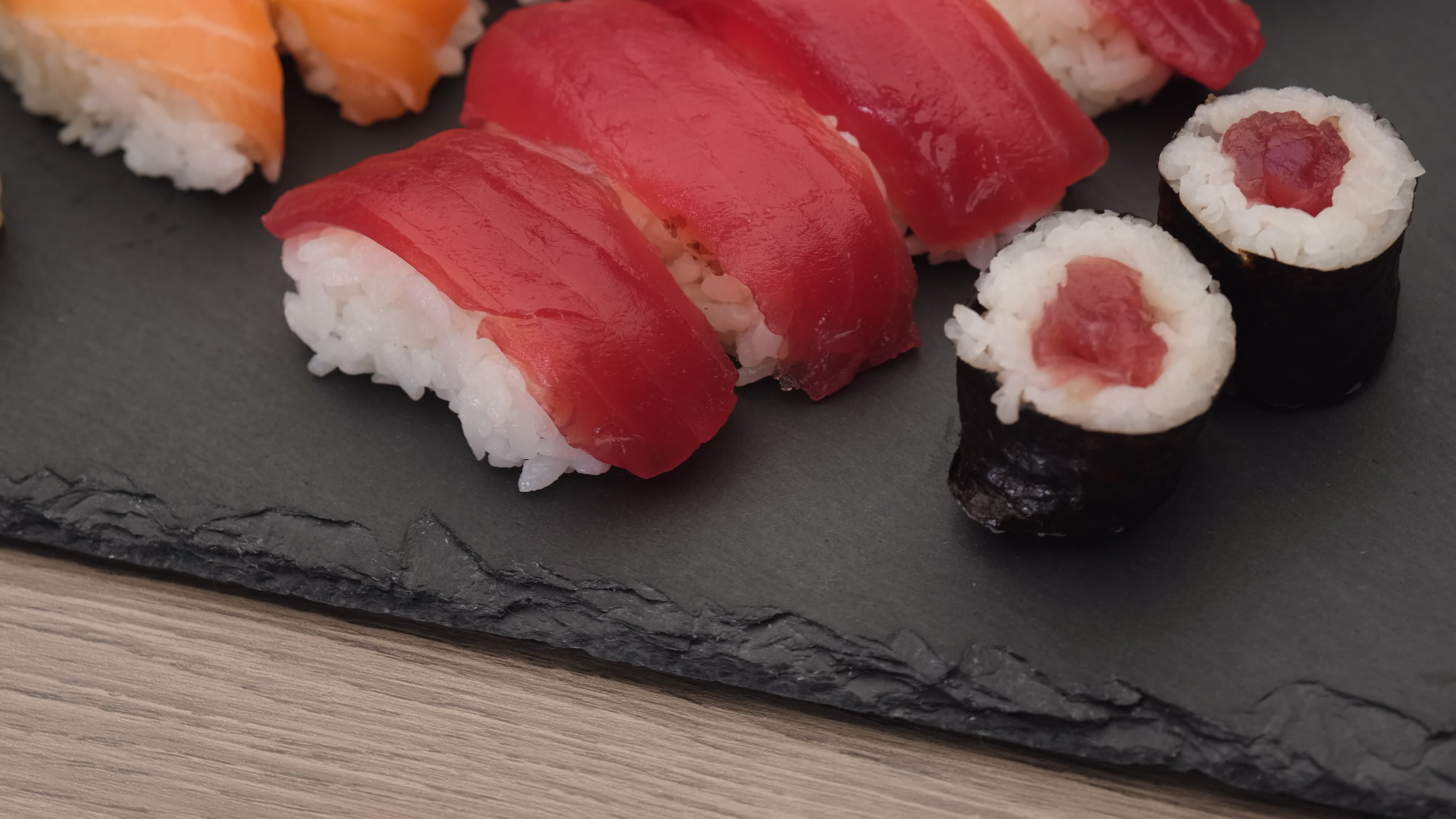 Sushi assortment with salmon nigiri, tuna nigiri, hosomaki and uramaki