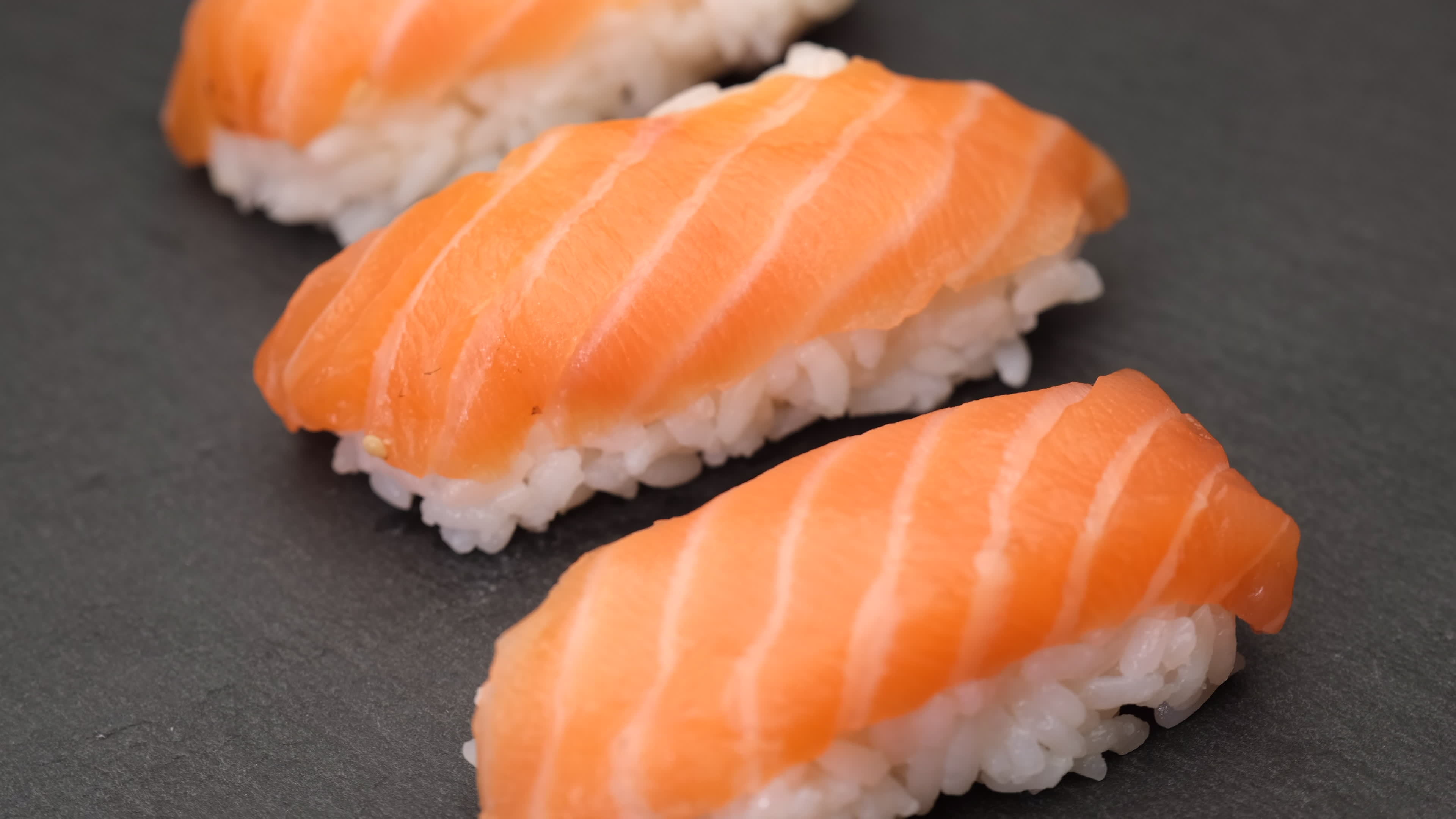Sushi nigiri salmon Asian Japanese food 16047083 Stock Video at Vecteezy