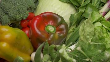 Red and yellow pepper and mixed various vegetables, healthy vegan or vegetarian food, diet, nutrition video