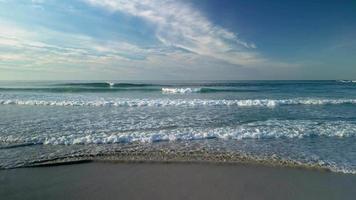 Waves Approaching On The Shore With Blue Sky At Background In Caion, Galicia, Spain. Aerial Drone Shot video