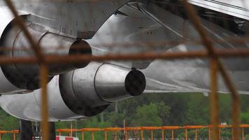 Close up gear and engine airplane taxiing before departure from Phuket airport video