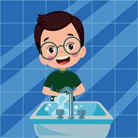 happy cute little kid boy wash hand in sink vector