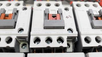 Close up the Contactors in panel circuit control. photo