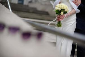 Picture of man and woman with wedding ring.Young married couple holding hands, ceremony wedding day. wed couple's hands with wedding rings. photo