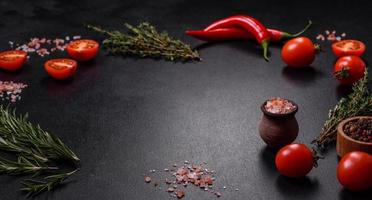 Fresh raw pork meat on the ribs with spices and herbs on a wooden cutting board photo