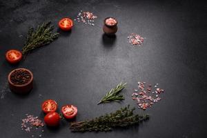 Fresh raw pork meat on the ribs with spices and herbs on a wooden cutting board photo