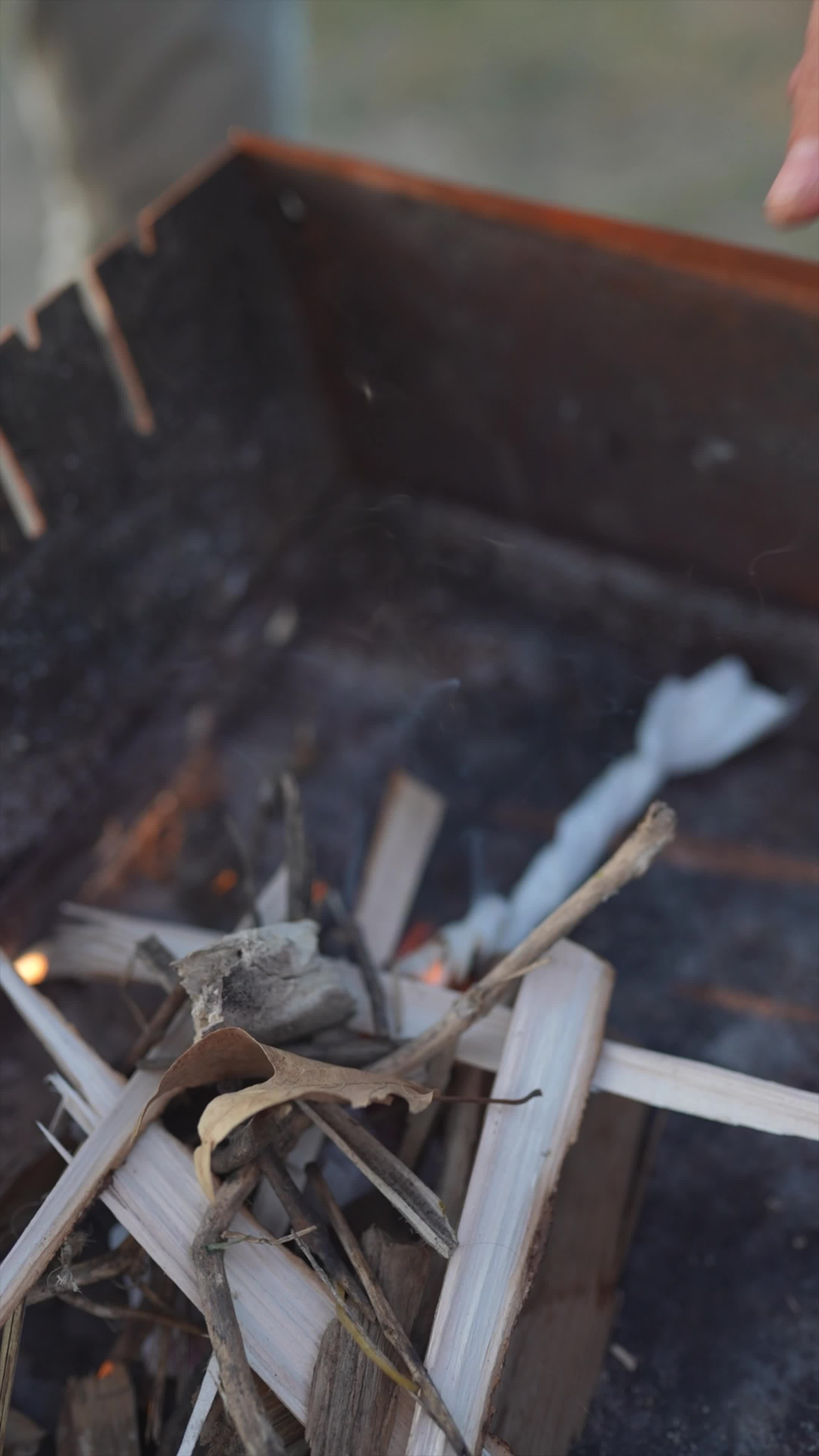 Starting a fire with kindling 16091127 Stock Video at Vecteezy