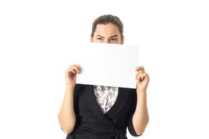 woman in uniform with white placard in hands photo