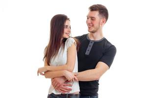 gentle fun young couple posing in Studio isolated on a white background photo