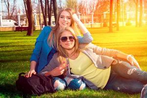 girls relaxing in the park photo