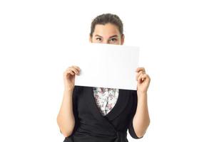 woman in uniform with white placard in hands photo