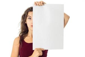 girl in red dress with white placard photo